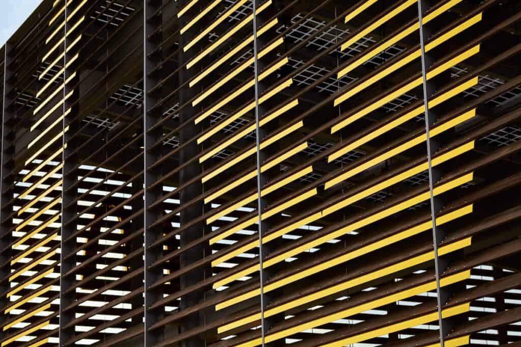 Close-up of 'Golden Arches' on Kebony louvred exterior to McDonald’s Flagship-Disney restaurant, in Orlando