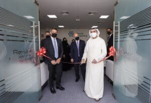 Sheikh Mohammed bin Humaid Al Qasimi cutting the ribbon during the re-opening ceremony of Circular Computing